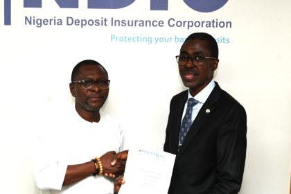 MD/CEO, Nigeria Deposit Insurance Corporation (NDIC), Bello Hassan receiving the formal Letter of Nomination of the Corporation as Daily Independent Regulatory Agency of the Year 2024 Award from the Managing Director/Editor-in-Chief, Daily Independent, Omanufeme Steve at the NDIC Head Office, Abuja.